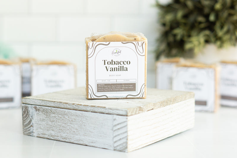 picture of tobacco vanilla soap wrapped with a brown and white label